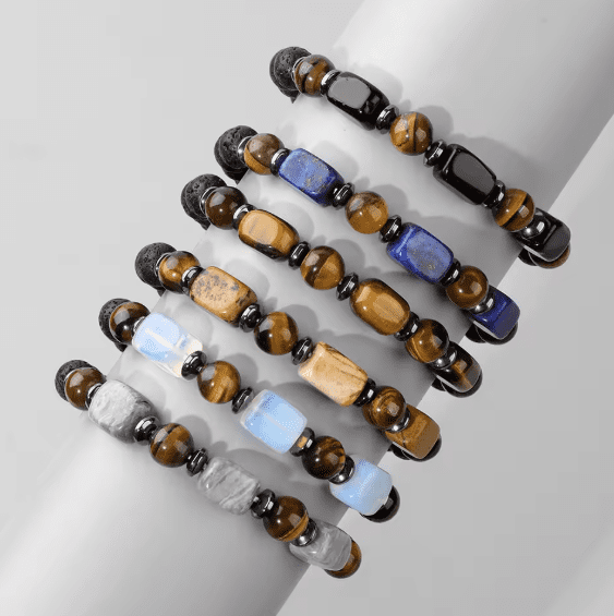 Stack of multicolored beaded stone bracelets