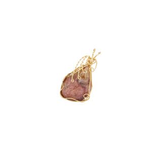 Raw pink gemstone pendant wrapped in gold
