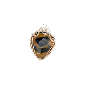 Wire-wrapped tiger's eye pendant on white